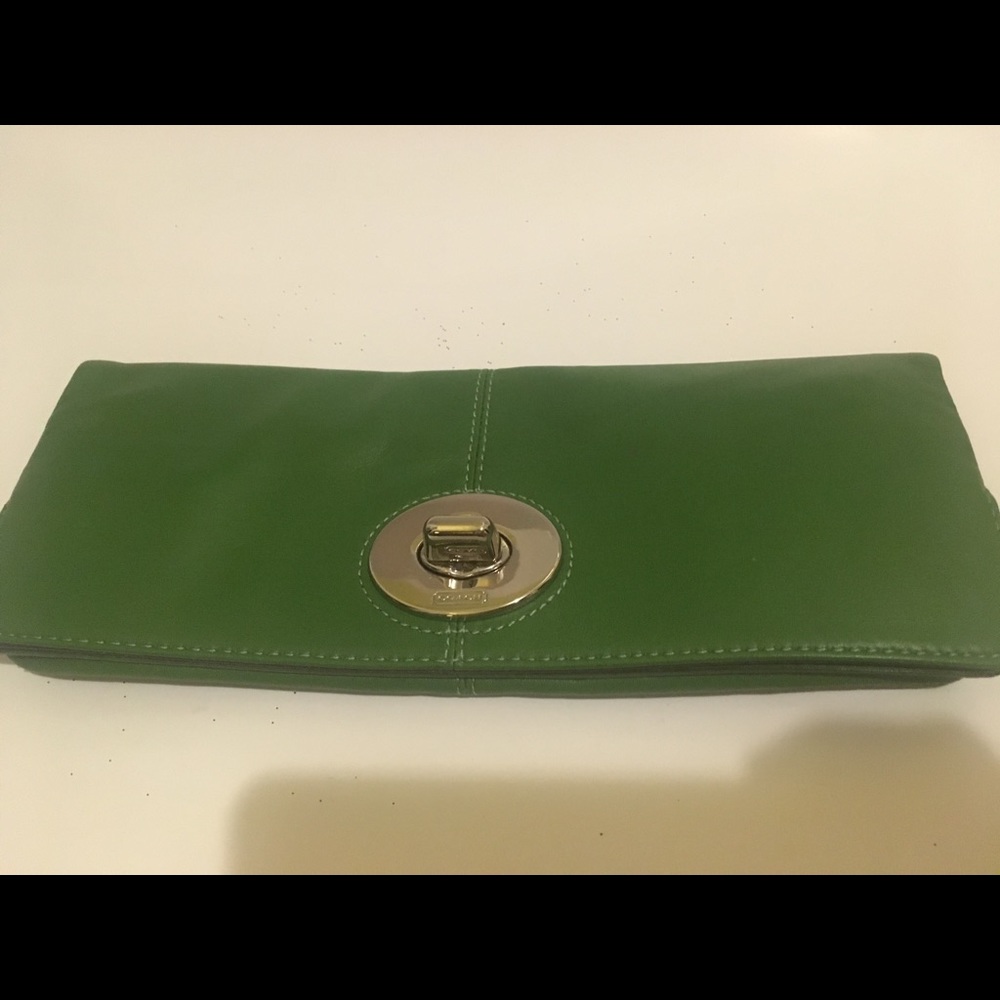 COACH  Green Clutch with Silver Hardware closure.